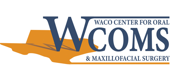 WCOMS logo